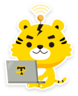 ノートパソコンを操作している黄色いトラのイラスト